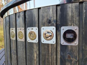 Vadības pogas hidromasāžas un LED apgaismojuma ieslēgšanai kublā